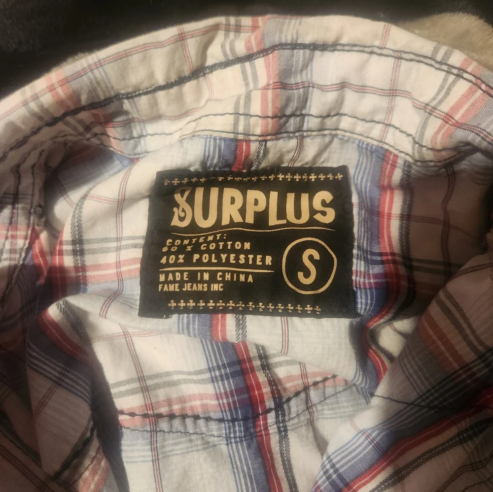 Surplus - Picture 2 of 2